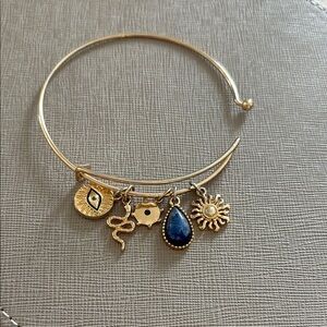 Gold Charm Bracelet with Blue and Gold Accents